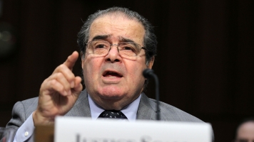 Antonin Scalia Laid To Rest With Son's Sermon In Washington, DC