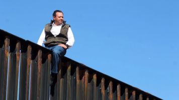 Politician Climbs A Border Barrier To Prove A Point To President Trump