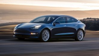Tesla's More Affordable Model 3 Hits The Road — In A Limited Fashion