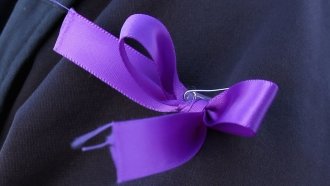 The purple ribbon is a universal sign of support for domestic violence victims.