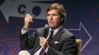 Tucker Carlson speaks onstage during Politicon 2018 at Los Angeles Convention Center on October 21, 2018 in Los Angeles.