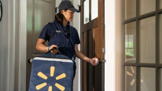 Walmart employee drops off groceries