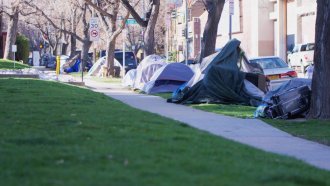 Tents by sidewalk in Denver
