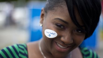 Young Florida voter wears an "I Voted Today" sticker, after casting vote for the 2012