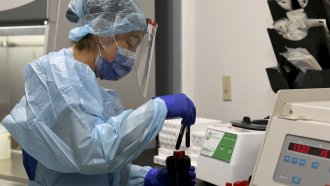 University of Miami Miller School of Medicine lab tech Sendy Puerto processes blood samples from study participants.