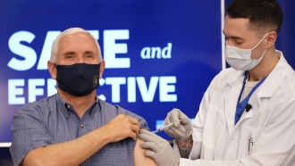 Vice President Mike Pence receives a Pfizer-BioNTech COVID-19 vaccine shot.