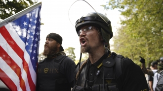 Members of the Proud Boys and other right-wing demonstrators rally on Saturday, Sept. 26, 2020, in Portland, Ore.