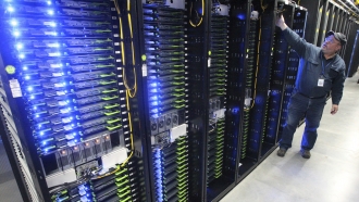 Site director for Facebook's Prineville data centers, shows the computer servers that store users' photos and other data