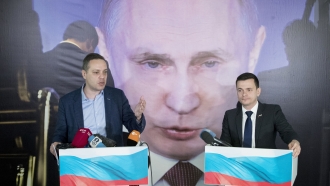Russian opposition leaders Vladimir Milov, left, and Ilya Yashin