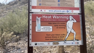Sign warns hikers.