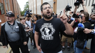 Matthew Heimbach voices his displeasure at the media after a court hearing for James Alex Fields Jr.