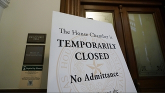 A sign shows the Texas House Chamber Closed at the Texas Capitol.