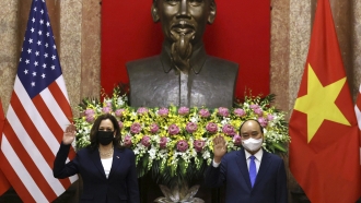 U.S. Vice President Kamala Harris, left, meets Vietnam's President Nguyen Xuan Phuc in the Presidential Palace.