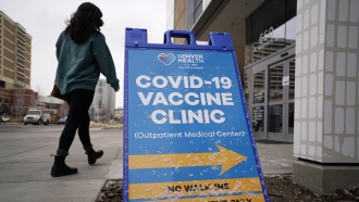 Sign promoting a COVID-19 vaccine clinic.