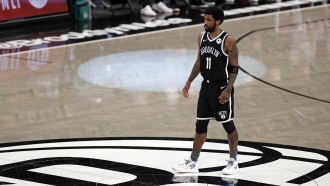 Brooklyn Nets guard Kyrie Irving on the basketball court