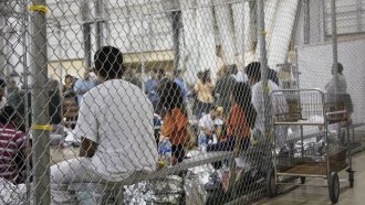 Migrants in detention facility