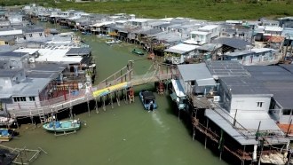 The Hong Kong town of Tai O has most of its houses on stilts above the rising sea level.