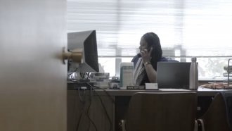 A woman working at a computer