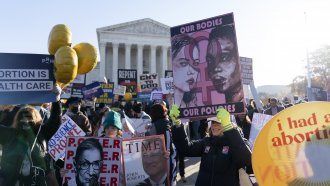 Abortion rights advocates demonstrate in front of the U.S. Supreme Court.