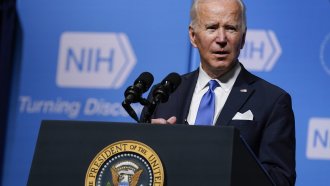 President Joe Biden speaks about the COVID-19 variant named omicron during a visit to the National Institutes of Health.