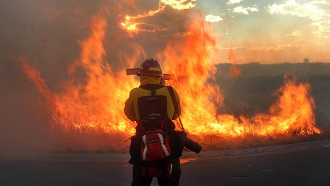 Firefighter battles Colorado wildfire