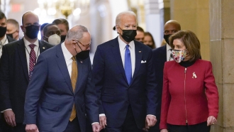 President Joe Biden, Senate Majority Leader Chuck Schumer and House Speaker Nancy Pelosi
