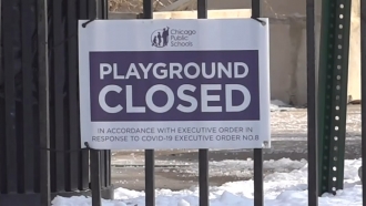 Sign at Chicago Public Schools playground stating it is closed due to COVID-19