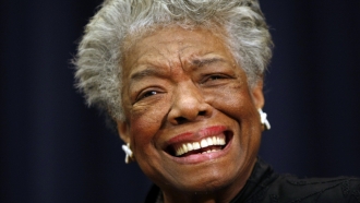 Poet Maya Angelou smiles at an event in Washington in 2008.