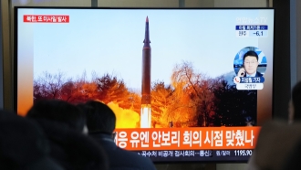 A file image of North Korea's missile launch during a news program