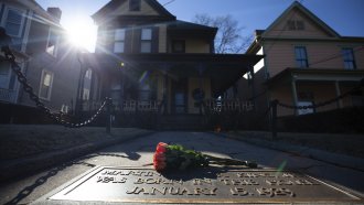 Flowers lay in front of the birthplace of Dr. Martin Luther King, Jr., on Jan. 18, 2021, in Atlanta.