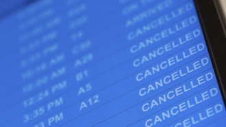 Flight cancellations on a departure board
