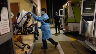 An EMT delivers a patient to a hospital