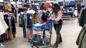Consumers shop at a retail store