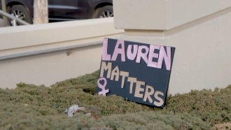 A sign shows support in the death investigation of Lauren Smith-Fields
