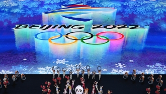 Performers dance in the pre-show during the opening ceremony of the 2022 Winter Olympics.