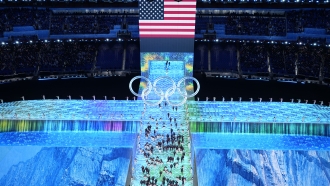 Athletes from the United States arrive during the opening ceremony of the 2022 Winter Olympics