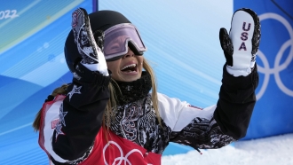 United States' Chloe Kim reacts during the women's halfpipe finals at the 2022 Winter Olympics