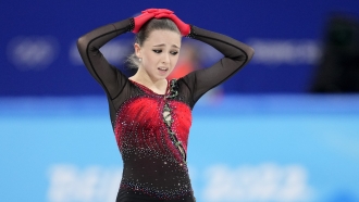 Kamila Valieva, of the Russian Olympic Committee, reacts after the women's team free skate