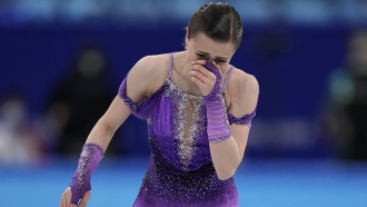 Kamila Valieva, of the Russian Olympic Committee, reacts in the women's short program
