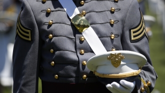 A Cadet listens during a commencement ceremony at the United States Military Academy in West Point, N.Y.