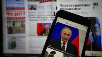 The app of the Russian government newspaper is displayed on an iPhone screen.