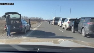 Cars line up to cross from Ukraine into Poland