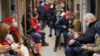 People on smartphones in Moscow, Russia