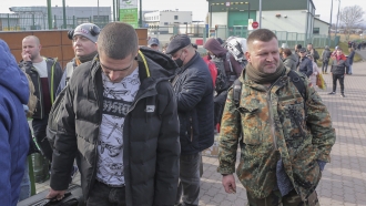 Volunteers crossing the border into Ukraine.