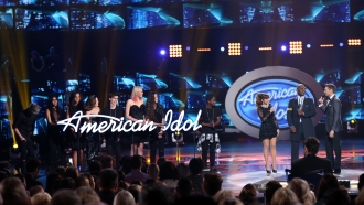 People stand on "American Idol" stage.