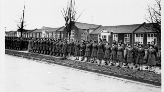Members of the 6888th battalion stand in formation in Birmingham, England, in 1945