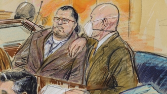 An artist sketch shows Guy Reffitt in court.