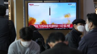 TV shows a North Korean missile launch