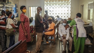 Ugandans receive Pfizer coronavirus vaccinations.