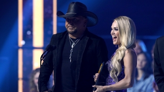 Jason Aldean and Carrie Underwood accept the award for collaborative video of the year for "If I Didn't Love You"